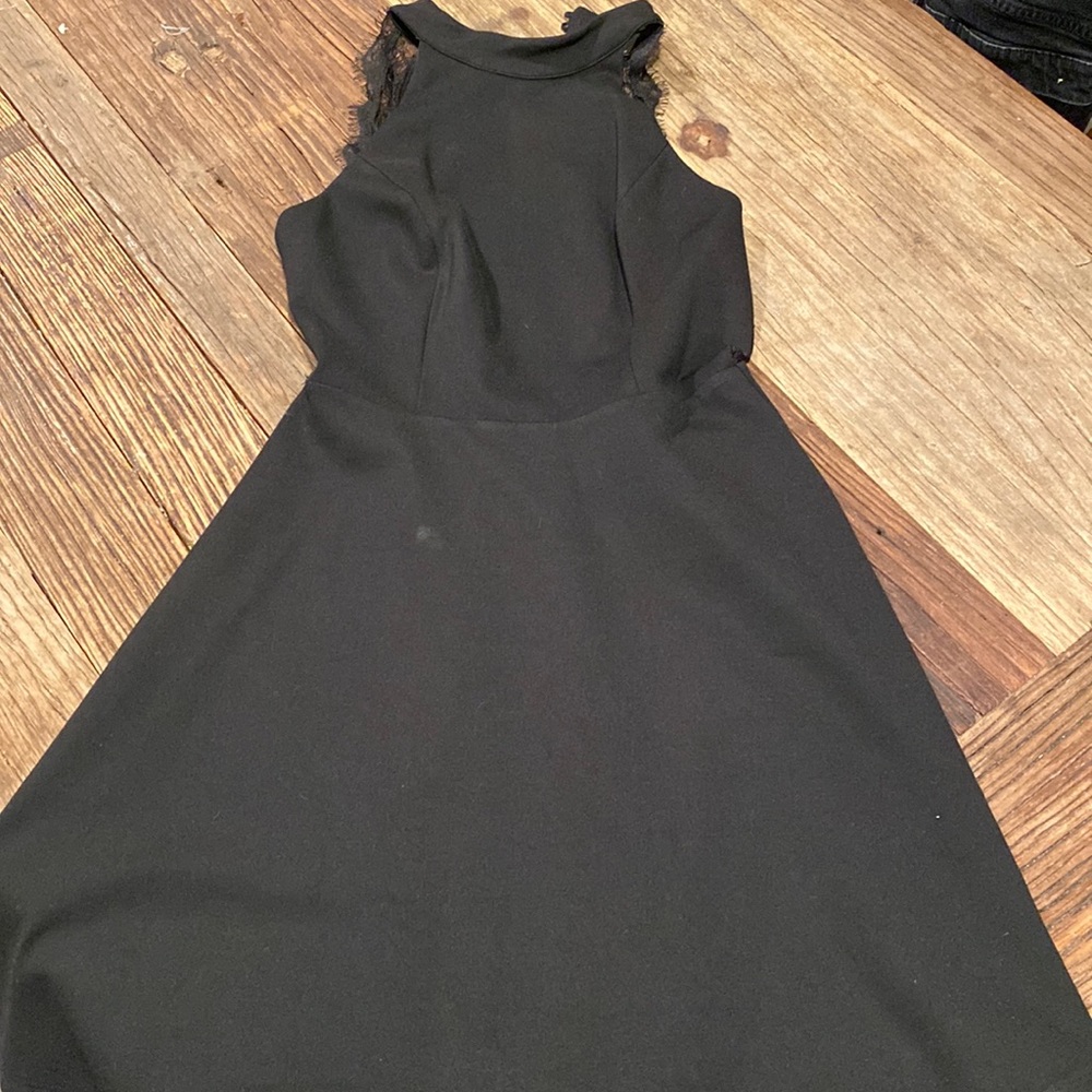 Women’s black dress with lace detail